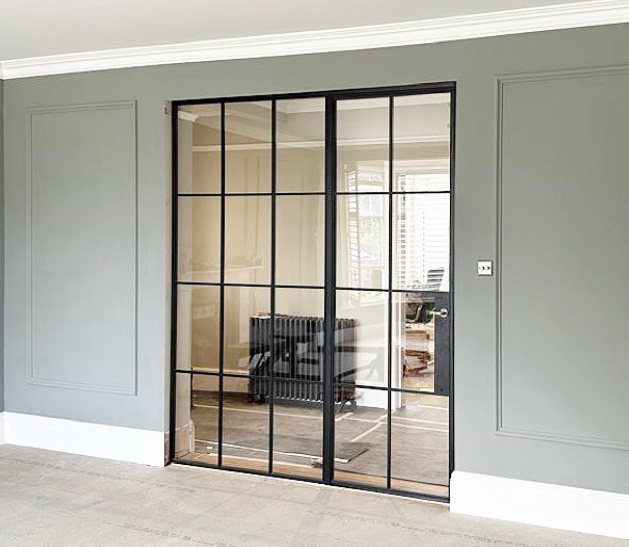 Steel and glass living room doors